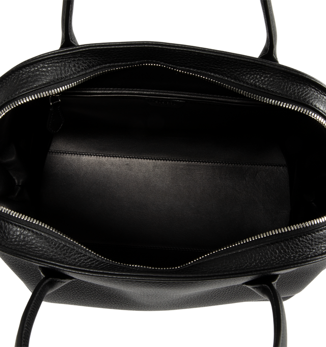 Image 3 of 4 - BLACK - The Row Agnes 15 Bag is crafted from finely grained calfskin leather and features a softly structured top-handle silhouette with tubular handles, gusseted side folds, a curved top zip closure, and a flat base. This designer leather handbag combines exceptional Italian craftsmanship with a spacious, minimalist design, while the naturally finished, metal-free tanned calfskin offers an exceptionally soft touch. Main Material: 100% Calfskin Leather. Lining: 100% Lambskin Leather. Dimensio
