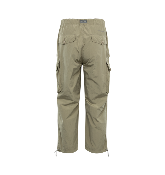 Image 2 of 3 - GREEN - AND WANDER 81 Oversized Cargo Pants featuring ripstop texture, straight leg, elasticated waistband, dart detailing, two side button-fastening pockets, two side cargo pockets, two rear button-fastening pockets, embroidered logo to the rear, tied cuffs and front button and zip fastening. 67% polyester, 33% nylon. 
