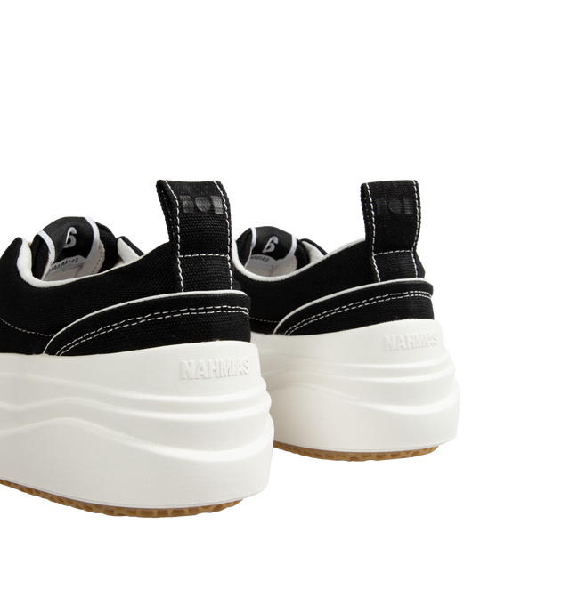 Image 3 of 9 - BLACK - NAHMIAS Ollie Sneaker featuring round rubber cap toe, lace up closure, textile logo patch at tongue, branded logo detail on outsole lip, padded tongue and collar, treaded logo outsole, rubber midsole, logo emboss on heel and logo gum bottom.