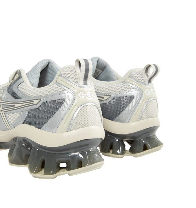 Image 3 of 5 - WHITE - ASICS GEL-QUANTUM KINETIC sneaker combines experimental engineering with functional details for everyday scenarios. Its performance capability is met with technical components to create a modern design thats built for urban exploration. ? Synthetic leathers and various mesh panels are layered throughout the upper to improve comfort. Midsole features Scutoid GEL technology that has a closely packed 3D geometry and an off-axis structure to improve shock absorption in daily scenarios, li