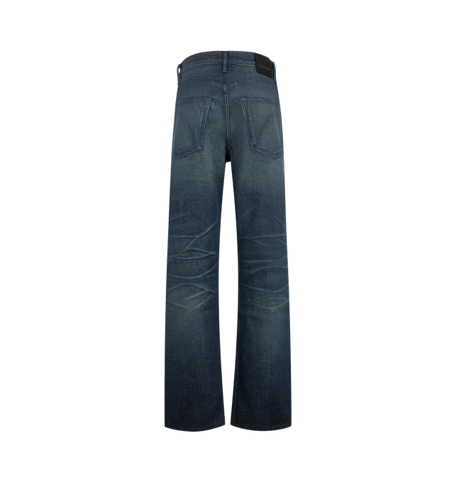 Image 2 of 3 - BLUE - TOm Ford Women's Stonewashed Denim Low Waist Boyfriend Denim Pants are crafted from premium Japanese denim and feature a relaxed boyfriend silhouette with a low-rise waist and classic five-pocket construction. Finished with a stonewashed indigo treatment, this timeless style blends American denim heritage with TOM FORD's refined aesthetic through signature tack button closures, rivets, and an embossed Alcantara logo patch at the back. Main Material: 100% Cotton. Made in the USA.