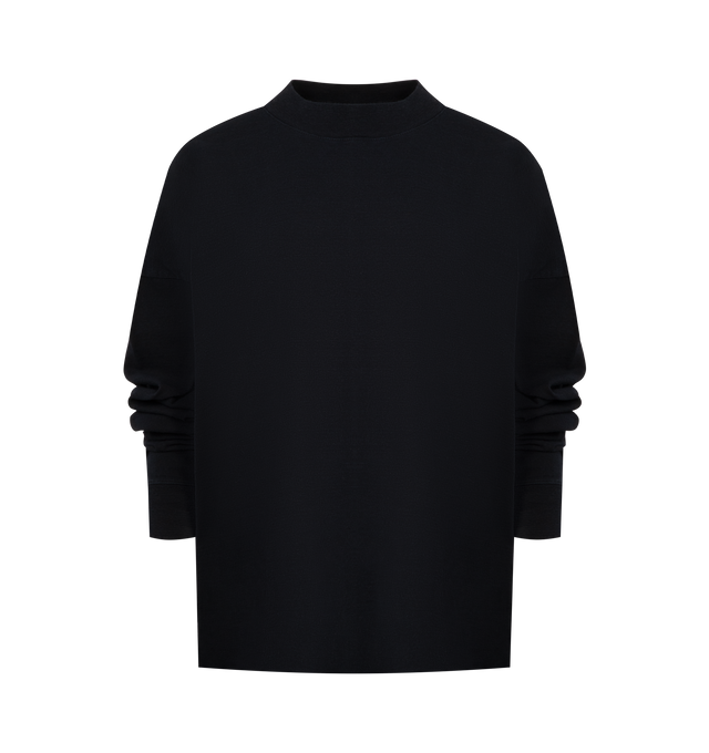 Image 1 of 2 - NAVY - THE ROW Raveena T-Shirt featuring long-sleeved mockneck top in indigo-dyed cotton jersey with oversized fit, ribbed cuffs and signature center back detail. 100% cotton. Made in Japan.