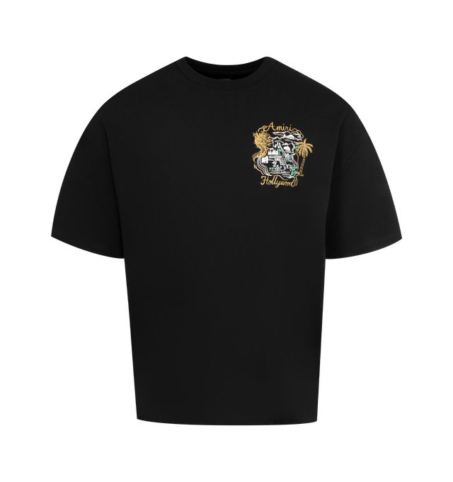 Image 1 of 2 - BLACK - AMIRI Hollywood Oversized T-shirt featuring cotton jersey, rib-knit crewneck, short sleeves, logo and text printed at chest and back and dropped shoulders. 100% cotton. Made in Italy.