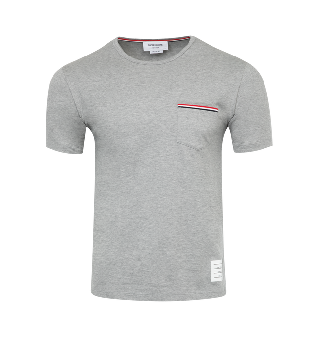 Image 1 of 2 - GREY - THOM BROWNE jersey t-shirt with crewneck collar, short sleeves, buttons at hem and striped detail at chest pocket. Made in Italy. 