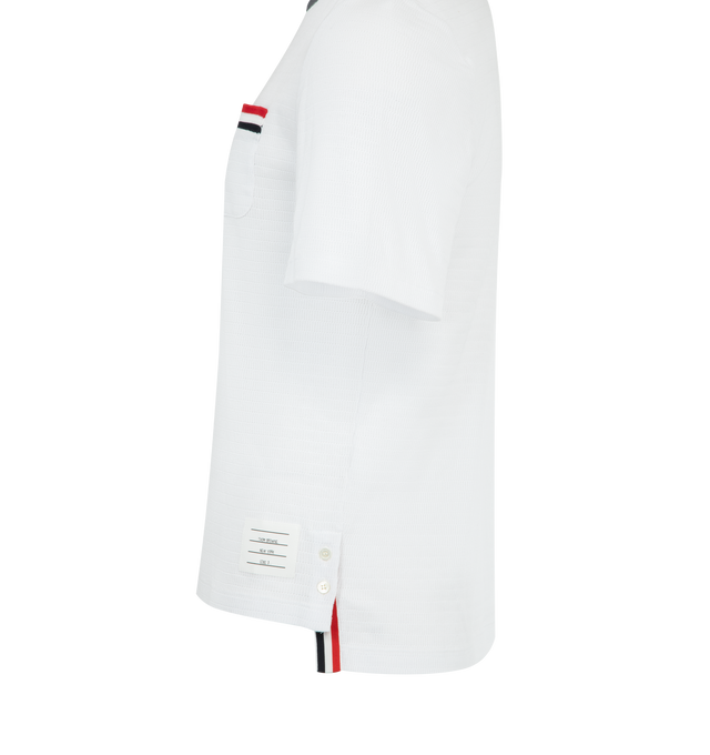 Image 3 of 3 - WHITE - THOM BROWNE Striped Trim Tee featuring chest patch pocket, name tag applique, buttoned side vents with signature striped grosgrain trim, short sleeves and signature striped grosgrain loop tab. 100% cotton. Made in Italy.