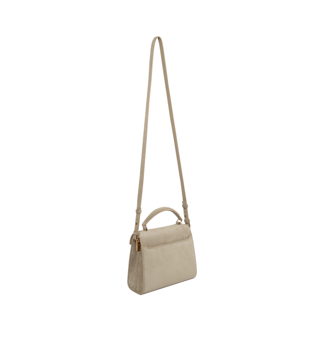 Image 2 of 3 - NEUTRAL - SAINT LAURENT Cassandra Mini Suede Bag featuring top handle bag in suede and leather, detachable, adjustable crossbody strap, envelope flap top with YSL magnetic closure, divided interior, one slip pocket and feet protect bottom of bag. 7.9"H x 6.3"W x 3"D. 