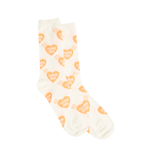 Image 1 of 2 - ORANGE - HUMAN MADE Heart Socks featuring mid-length, soft, comfortable cotton blend, all-over heart logo pattern and jacquard weave logo. 47% cotton, 20% nylon, 20% acrylic, 11% polyester, 2% spandex.