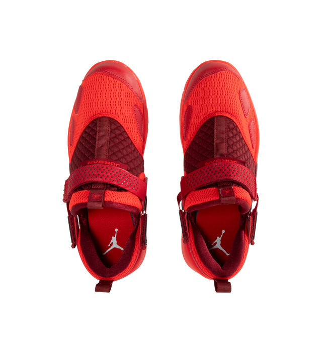 Image 5 of 5 - RED - JORDAN Trunner LX Sneaker featuring synthetic leather, canvas and airy knits to give durability, structure and breathable comfort, chunky foam midsole, rubber outsole and reflective details.
