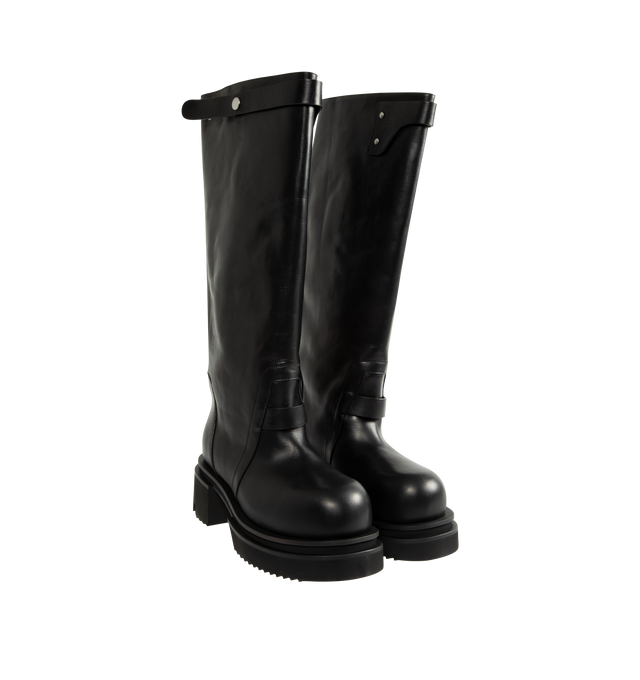 Image 2 of 4 - BLACK - Rick Owens Men's Naska Bogun Boots are crafted from washed calf leather and feature an under-the-knee silhouette with a wide shaft, a snap-fastening strap at the top, rounded toes, a geometric heel counter, and a Bogun rubber mega creeper sole with a toothed square heel. Main Material: 100% Calf Leather. Lining: 100% Calf Leather. Insole: 100% Calf Leather. Height: Under the Knee. Made in Italy.