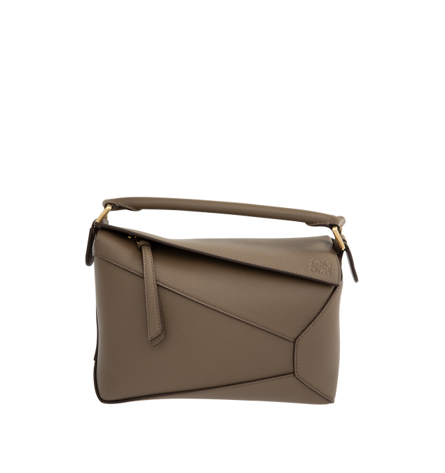 Image 1 of 3 - BROWN - LOEWE Small Puzzle Edge Bag in soft grained calfskin featuring geometric lines, cuboid form, overlapped panels with single stitch lines, shoulder, crossbody or hand carry, detachable and adjustable strap, zip closure with calfskin pull, one external zip rear pocket, one internal slip pocket, herringbone cotton canvas lining and embossed Anagram. Soft grained calf. 16.5 cm x 24 cm x 10.5 cm. Made in Spain.