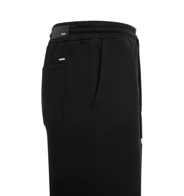 Image 3 of 3 - BLACK - AMIRI MA Surf Sweatshort featuring regular fit, elastic waistband with drawcord, MA logo at front, two side seam pockets, one rear pocket and logo patch at rear and silver tone logo tag. 100% cotton. Made in Italy.