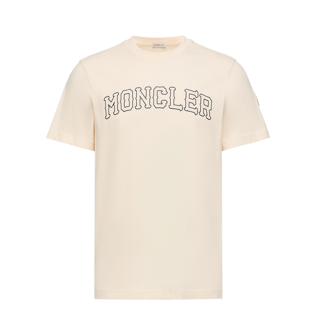 Image 1 of 1 - NEUTRAL - Moncler Mens Logo Cotton T-Shirt is crafted from cotton jersey and features a classic crew neck, short sleeves, a printed Moncler logo, and a signature logo patch. This designer cotton T-shirt combines a timeless crewneck silhouette with elevated logo detailing for versatile everyday wear. Main Material: 100% Cotton; Collar: 100% Cotton. Made in Turkey.