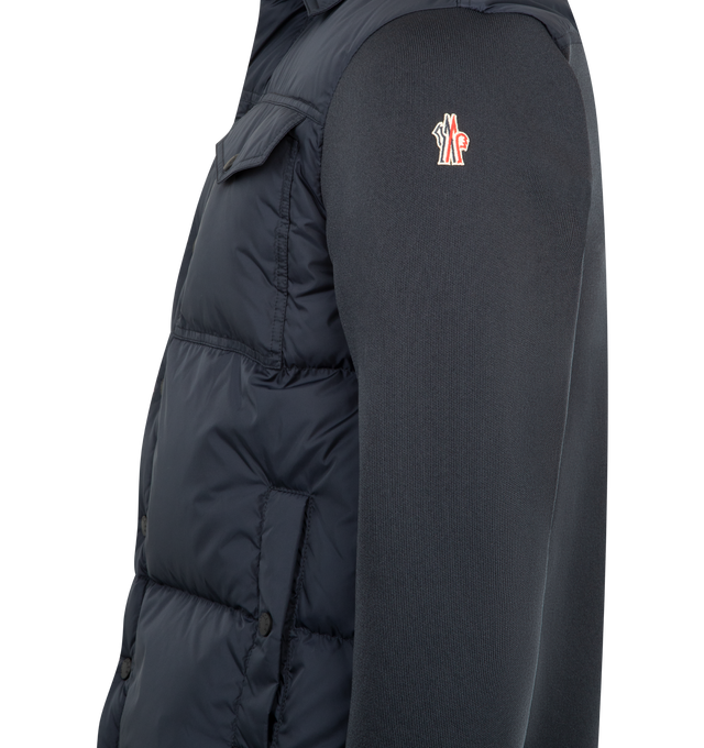 Image 3 of 3 - BLUE - MONCLER GRENOBLE Padded Zip-Up Cardigan featuring down-filled rainwear front, padded, gauge 14, water-repellent look zipper closure, pockets with snap button closure and stretch jersey wrist gaiters. 100% polyamide/nylon. 100% polyester. Padding: 90% down, 10% feather. Made in Moldova.