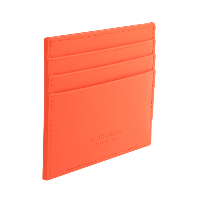 Image 2 of 3 - ORANGE - BOTTEGA VENETA Intrecciato Stamp Credit Card Case featuring credit card case in calf leather with embossed Intrecciato pattern, three card slots and one central pocket. 3.1" x 4.1" x 0.2". Calfskin. Made in Italy.