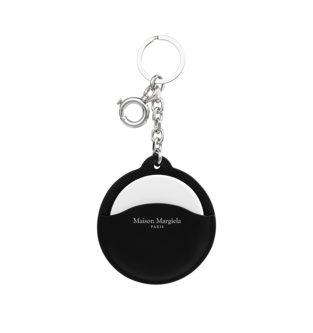 Image 1 of 3 - BLACK - MAISON MARGIELA Circular Keychain featuring grained and buffed calfskin keychain, slot with removable mirror, logo embossed at face, stitching at back face and clasp and keyring at top. H3.25 x W3.25. Calfskin. Made in Italy.
