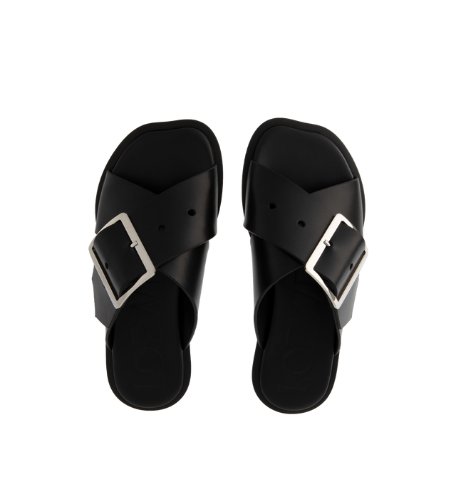 Image 4 of 4 - BLACK - Loewe Petal Belt flat sandal in vegetable-tanned calfskin featuring a criss-cross upper recalling a belt and the signature square buckle, 20mm Campo kitten heel, engraved LOEWE on the buckle, padded leather insole, and rubber island injected in the leather outsole for better grip. Made in Italy.