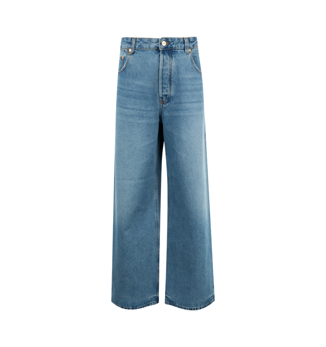 Image 1 of 2 - BLUE - JACQUEMUS Oversized Jeans featuring mid rise, washed indigo denim, long wide leg, J belt loop, five pockets, metal studs and rivets, button fly, large denim patch above back pocket and contrast stitching. 100% cotton. Made in Italy.