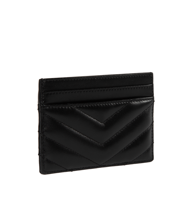 Image 2 of 3 - BLACK - SAINT LAURENT Monogram Card Case featuring five card slots, gold tone hardware, cassandre and chevron-quilted overstitching. 4 X 2.8 X 0.1 inches. 100% lambskin. Made in Italy.  
