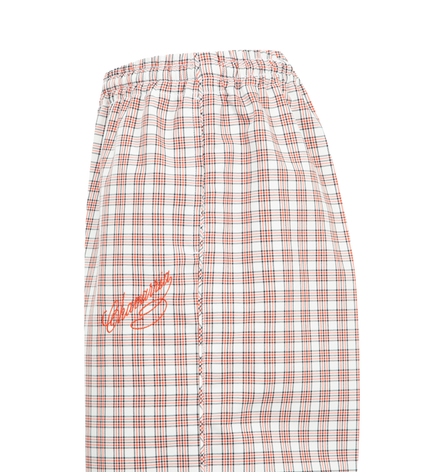 Image 3 of 3 - MULTI - WILLY CHAVARRIA Ruff Rider Track Pant featuring a loose fit, an elastic waistband with a hidden drawstring, embroidered script logo on the left and side slit pockets. 100% polyester.