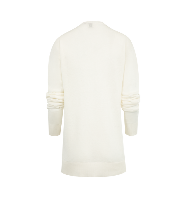 Image 2 of 2 - WHITE - TOTEME Long-Sleeve Knit Tee featuring oversized fit, crew-neck, long sleeves and light, semi-sheer knit. 90% lyocell, 10% cashmere.