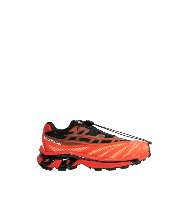 Image 1 of 5 - RED - Salomon XT-EVO Sneakers are crafted from synthetic and textile materials and feature an evolved XT silhouette inspired by competitive trail running and exploration. Defined by sharp, aggressive lines and a race-ready aesthetic, this performance-driven style combines lightweight construction with Salomon's signature Quicklace system for a secure fit. Finished with a textile lining, textile insole, and durable rubber outsole, the XT-EVO delivers comfort, support, and traction for everyday