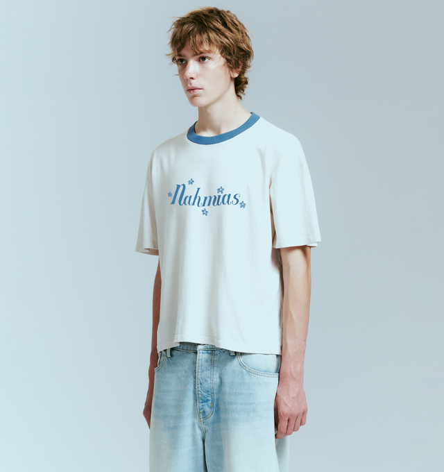 Image 3 of 4 - WHITE - NAHMIAS Blossom Ringer T-shirt featuring crew neckline with contrast ringer trim, Nahmias Bloom graphic at chest, short sleeves and regular fit. 100% cotton.