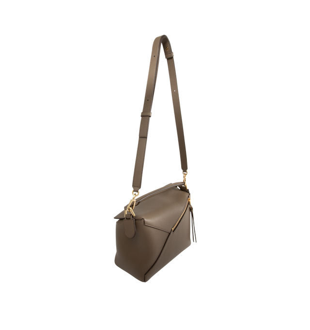 Image 2 of 3 - BROWN - LOEWE Small Puzzle Edge Bag in soft grained calfskin featuring geometric lines, cuboid form, overlapped panels with single stitch lines, shoulder, crossbody or hand carry, detachable and adjustable strap, zip closure with calfskin pull, one external zip rear pocket, one internal slip pocket, herringbone cotton canvas lining and embossed Anagram. Soft grained calf. 16.5 cm x 24 cm x 10.5 cm. Made in Spain.