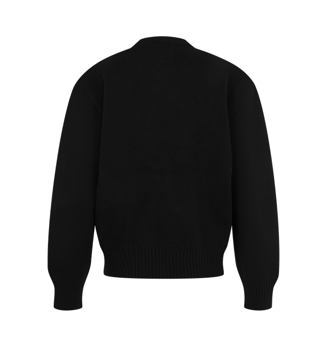 Image 2 of 2 - BLACK - Toteme Women's Cropped Crew-Neck Sweater is crafted from a merino wool and cotton blend and features an abbreviated silhouette, subtly rounded sleeves, and a compact half Punto Milano knit construction. Designed with ribbed trims at the crew neckline, cuffs, and hem, this sculptural knit offers a structured shape with a lightweight feel. Main Material: 60% RWS Merino Wool, 40% Cotton.