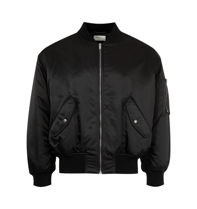 Image 1 of 3 - BLACK - SAINT LAURENT Bomber Jacket made with recycled polyamide featuring ribbed trims, viscose and cotton lining, front zip closure, water-repellent, two jetted pockets with snap-button flap at the front, one zip pocket on the sleeve and baseball collar. 100% polyamide. Made in Italy.
