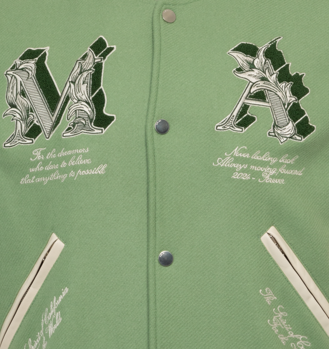 Image 4 of 4 - GREEN - AMIRI MA Angel Varsity Jacket featuring chenille applique, leather contrast sleeves, banded rib detailing, welt zipper pockets and snap button closure. Wool shell, leather sleeves, viscose lining. Made in Italy.  