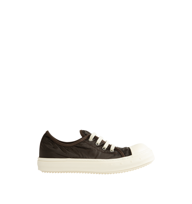 Image 1 of 5 - BROWN - Rick Owens Men's Tower Low Sneakers are crafted from a nylon and polyester blend and feature an extra-low silhouette that rises at the back, four-eyelet lace-up closure, six side vents, toe caps, and signature shark-tooth bumper soles. Main Material: 67% Nylon, 33% Polyester. Toe: 100% Calf Leather. Lining: 67% Nylon, 33% Polyester. Insole: 100% Calf Leather. Sole: 100% Thermoplastic Rubber. Closure: Lace-Up. Made in Italy.