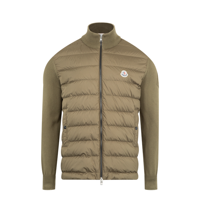 Image 1 of 3 - GREEN - MONCLER Padded Cardigan featuring lightweight micro chic lining, down-filled, stocking stitch, Gauge 7, zipper closure, vertical welt pockets with snap button closure and embossed embroidery. 100% polyester. 100% cotton. Padding: 90% down, 10% feather.