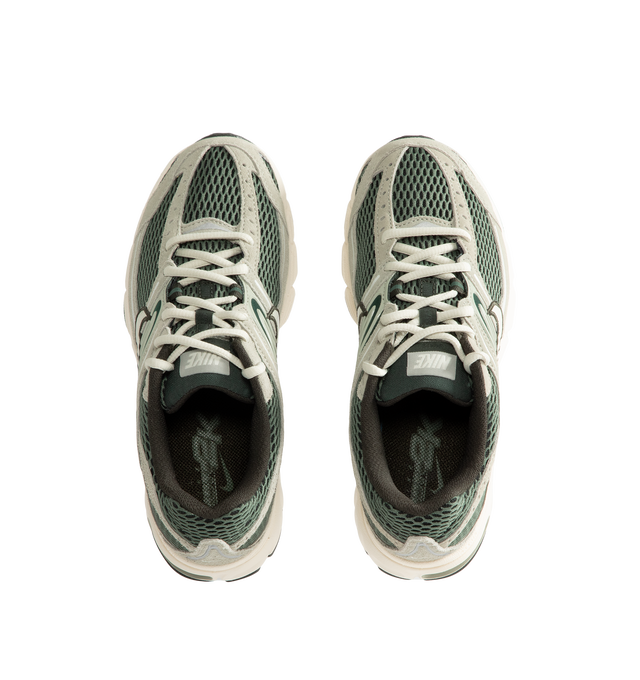 Image 5 of 5 - GREEN - Nike Air Max Moto 2K Sneakers feature a layered upper crafted from synthetic leather and textile with metallic accents for a modern, Y2K-inspired look. These performance-inspired lifestyle sneakers combine Max Air cushioning, a lightweight foam midsole, and a durable rubber outsole for all-day comfort and reliable traction. Main Material: Synthetic Leather and Textile. Midsole: Foam. Sole: Rubber.