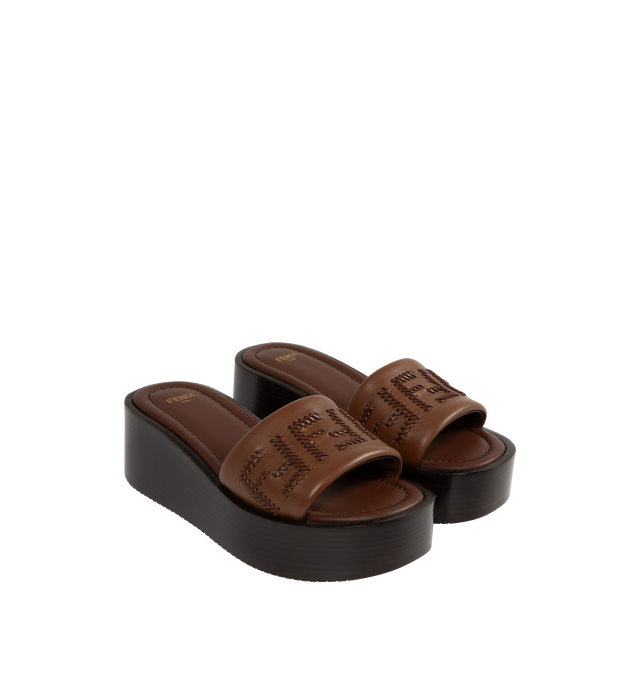 Image 2 of 4 - BROWN - FENDI Sunshine Platform Slide featuring wide-band, a platform sole and tone-on-tone leather threading that depicts the iconic FF motif. 100% calf leather. Made in Italy.
