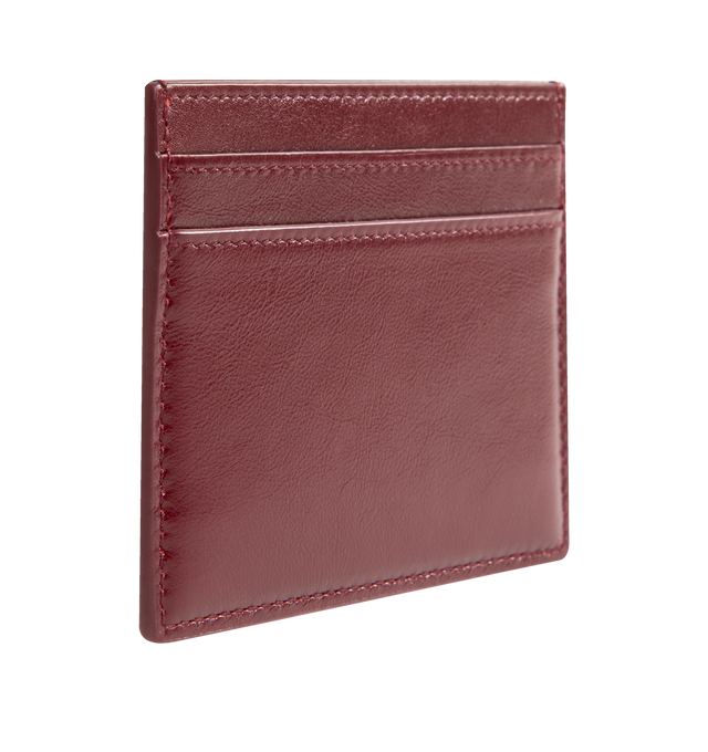 Image 2 of 3 - RED - SAINT LAURENT Card Case in shiny leather featuring leather lining, bronze-tone hardware and five card slots. 4.1" X 1.8" X 0.2". Calfskin. Made in Italy.