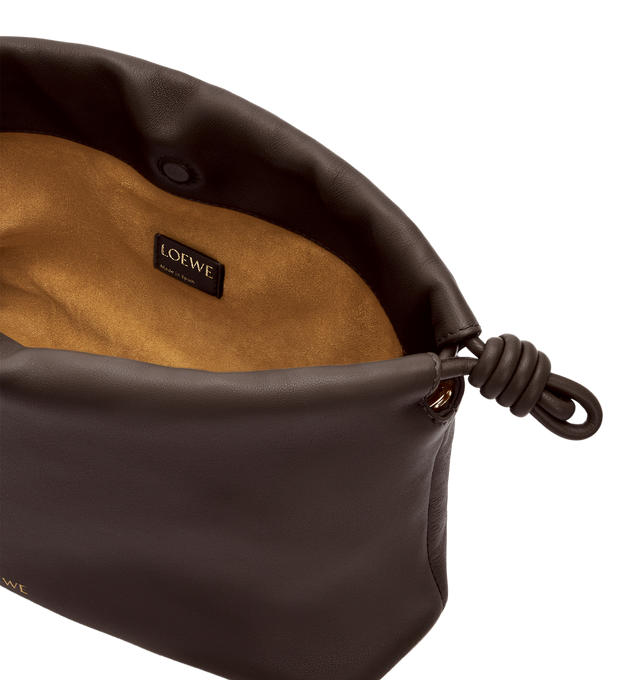 Image 5 of 6 - BROWN - LOEWE Medium Flamenco Purse featuring a lightweight and soft bag with a ruched shape, historical knot drawstrings, shoulder, crossbody or hand carry, detachable donut chain with Anagram Pebble, detachable and adjustable leather strap, magnetic closure, suede lining and embossed LOEWE. Mellow nappa lambskin. 20 cm x 30 cm x 10.5 cm. Made in Spain.