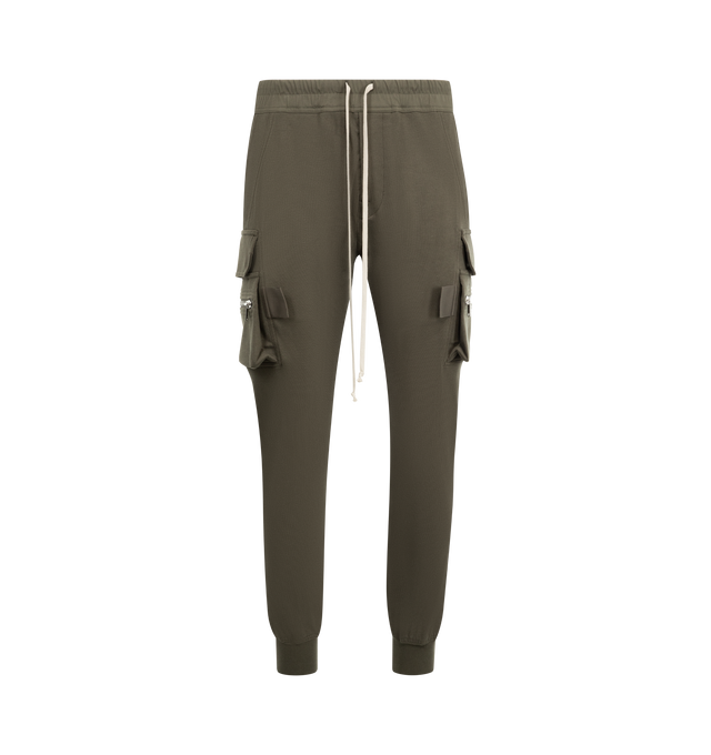 Image 1 of 3 - GREEN - RICK OWENS Mastadon Cargo Pants featuring slim-fit, stretch GOTS-certified organic cotton, drawstring at elasticized waistband, four-pocket styling, button fly, pen slots at front, elasticized cuffs and cargo and zip pocket at outseams. 97% cotton, 3% elastane. Made in Italy.