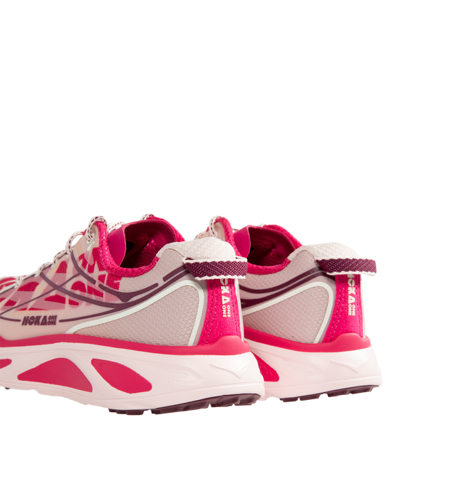Image 3 of 5 - PINK - HOKA Unisex Huaka Pro is crafted with a lightweight performance upper and features a retro-inspired silhouette drawn from the brands archives. Originally designed as a gravel-to-road trainer, this lifestyle sneaker is updated with a translucent cage, sublimated HOKA graphics, molded eyelets, a microfiber toe cap overlay, and a painted midsole. Finished with original Huaka tooling and a heel pull loop, it combines Y2K-inspired design with everyday comfort. Upper: Lightweight Textile wit