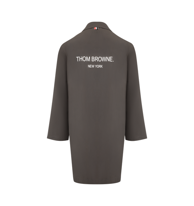 Image 3 of 4 - GREY - THOM BROWNE Memory Tech Smoch Jacket featuring a removable pouch to pack and take on the go, front button closure, 2 front flap pockets, interior pocket with name tag, single removable interior pocket, buttoned side vents with signature striped grosgrain trim and signature striped grosgrain loop tab. 100% polyester. Made in Italy.