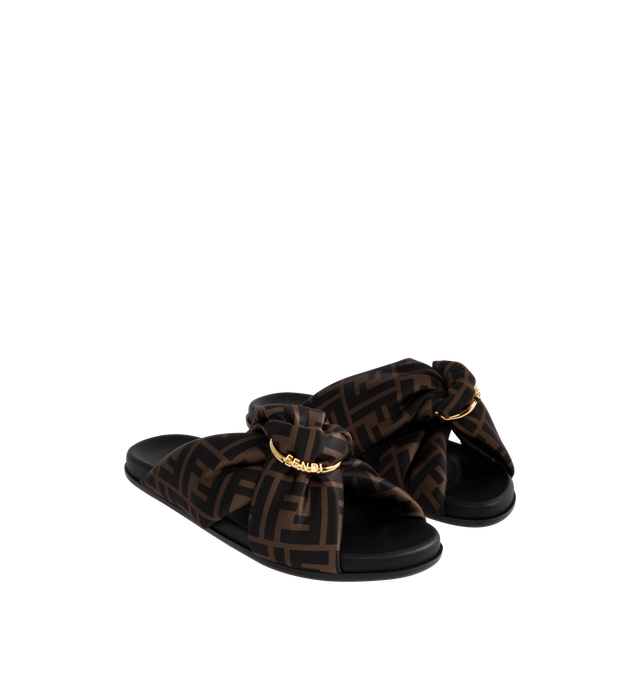 Image 2 of 4 - BROWN - FENDI Feel Satin Slides featuring padded double-band flat slides with decorative D-ring buckle with three-dimensional Fendi lettering. Made of satin with the iconic FF motif in shades of brown. Black leather insole and edges. Gold-finish metalware.Made in Italy.
