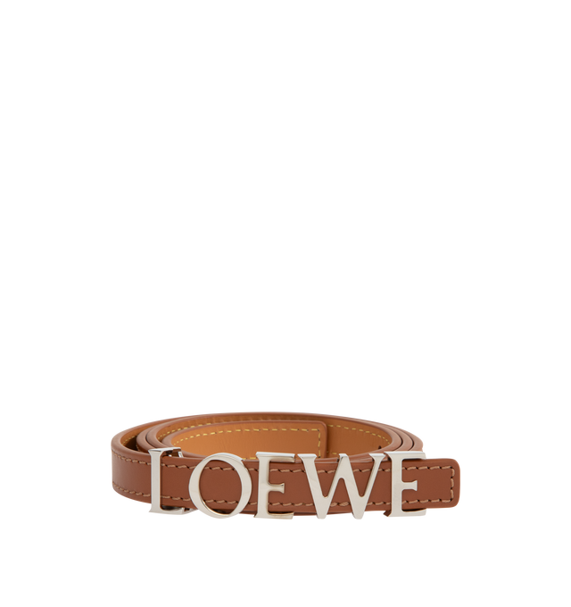 Image 1 of 2 - BROWN - LOEWE Loewe Bold Belt featuring logo lettering, pre-drilled holes, adjustable fit, gold-tone hardware and buckle fastening. 100% leather. Made in Spain.