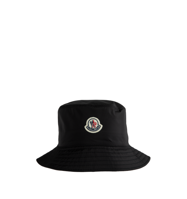 Image 1 of 2 - BLACK - MONCLER Bucket Hat crafted from rainwear featuring logo patch. 100% polyamide/nylon. Lining: 100% cotton. Made in Italy. 