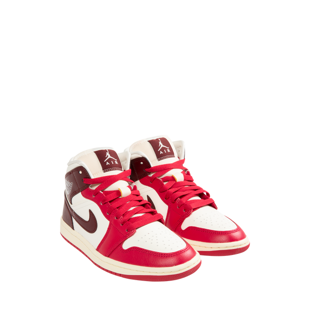 Image 2 of 5 - RED - JORDAN Air Jordan 1 Mid Sneaker featuring padded collar, premium leather and synthetic upper, Air-Sole unit in the heel and rubber outsole.