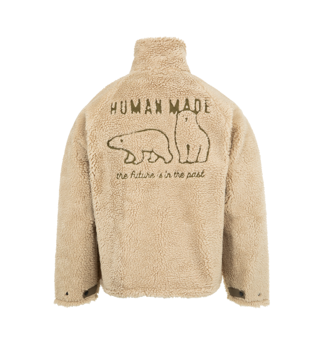Image 2 of 3 - BROWN - HUMAN MADE Fleece Jacket featuring soft polyester boa fabric, heart-shaped magic tape on the left chest pocket, removing the tape reveals a text graphic, contrasting piping and pockets, chain-stitched animal graphic on the back, heart-shaped snap buttons on the cuffs and mesh lining with wind-proof film. 100% polyester. Contrast: 100% nylon.