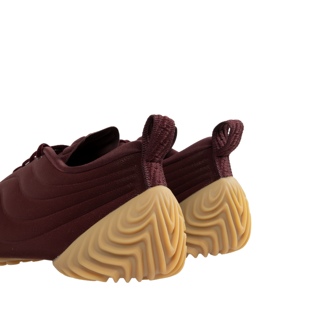 Image 3 of 5 - RED - NIKE Astra Ultra Sneaker featuring luxe upper with rippling design lines, sleek, low-profile silhouette, asymmetrical velvet laces, rounded toe, heel pull tab and rubber outsole.