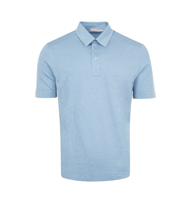Image 1 of 3 - BLUE - MONCLER Double Leather Logo Cotton Polo Shirt featuring cotton blend piquet, short sleeves, snap button closure and leather logo patch. 50% cotton, 50% lyocell.