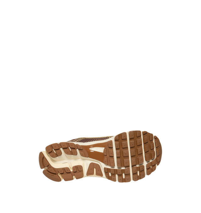 Image 4 of 5 - BROWN - Nike Womens Zoom Vomero 5 Sneakers feature a layered design with textile, synthetic leather, and plastic accents. Finished with Zoom Air cushioning, supportive side caging, reflective details, and a durable rubber outsole. Main Material: Textile, Synthetic Leather, Plastic; Outsole: Rubber. Imported