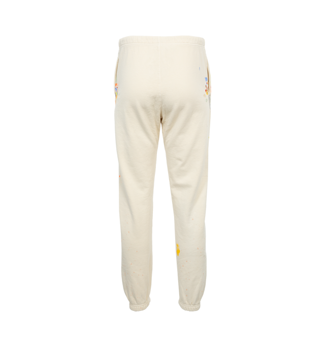 Image 2 of 4 - WHITE - GALLERY DEPT. LOGO SWEATPANTS featuring tapered leg, low-crotch style, elasticated at the waist and hem, paint splatter and logo on leg. 100% cotton. 