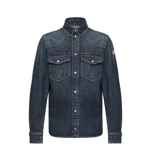 Image 1 of 1 - BLUE - Moncler Men's Denim Shirt Jacket is crafted from cotton denim and features a versatile workwear-inspired silhouette with long sleeves, a snap-button front closure, and chest pockets with snap-button closures. Designed for effortless layering across seasons, this everyday style is finished with adjustable cuffs, mother-of-pearl-effect snap buttons, and a signature logo patch. Main Material: 100% Cotton.