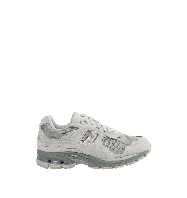 Image 1 of 5 - GREY - NEW BALANCE 2002DX Sneaker featuring soft French terry fabric, ABZORB midsole, ABZORB SBS heel cushioning, N-ergy technology for superior shock absorption, atability Web outsole technology and GORE-TEX waterproof fabric.